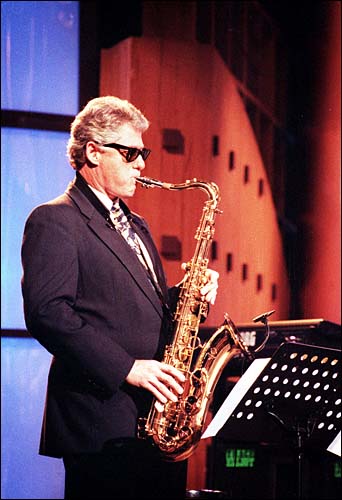arsenio hall position.  Clinton appearing with his tenor saxophone on the Arsenio Hall Show.